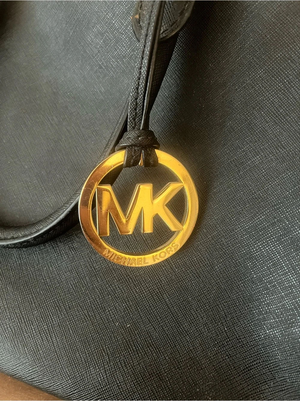 Michael Kors Black Saffiano Leather Tote with Gold Hardware.